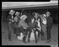 Cowboy musicians and guests at Rogers Ranch resort, Palm Springs, 1941