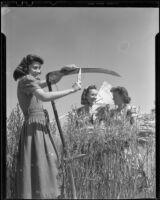 Three young girls preparing for hay making, Santa Monica, 1938