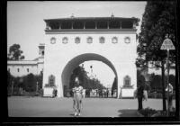 Carolyn Bartlett in front of the Arco del Porvenir at the California Pacific International Exposition, San Diego, 1935-1936