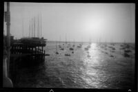 Sailboats and pier in Newport Bay, Newport Beach, 1937