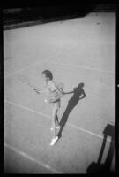 Carolyn Bartlett playing tennis, 1937