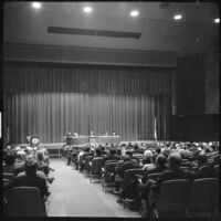 People seated in an auditorium, 1950-1965