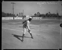 Baseball pitcher Satchel Paige after a pitch, Los Angeles, circa 1933