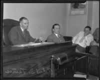 Robert S. James, suspect in Mary Emma James murder case, on witness stand, Los Angeles, 1935