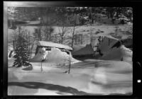 Cabins buried by snow, June Lake, 1938
