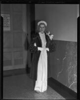 Model Diana Gibson in chenille dress and fur coat, Times Fashion Show, Los Angeles, 1936