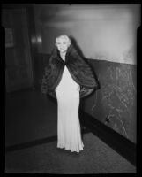 Model in dress and fur wrap, Times Fashion Show, Los Angeles, 1936