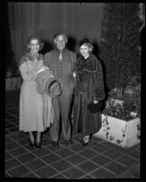 Man and two women, Times Fashion Show, Los Angeles, 1936