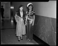 Models in fur-trimmed coat, sailor-style dress, Times Fashion Show, Los Angeles, 1936