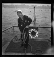 Sea Scout Karl Cantner with rope on Pinta, Balboa peninsula (Newport Beach), 1937