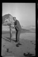 Murder victim Dwight Faulding on beach, [1937?]
