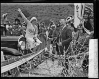 California governor C.C. Young, Miss Canada, Miss Mexico, and crowd at ribbon-cutting ceremony, Roosevelt Highway, Malibu, 1929