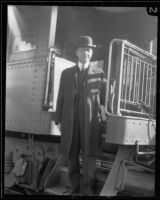 Newton D. Baker, former Secretary of War, at exit from train, [Los Angeles?], 1927
