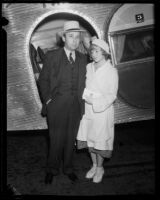Henry Bern and Irene Harrison outside airplane, 1932