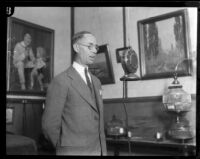 E. K. Barnes, manager of KHJ radio station, speaks into a microphone, Los Angeles, circa 1925