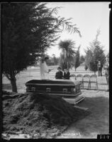 Anna Laura Barnett and Maxine Sturgess listen to Rev. Frank L. Gibson’s prayer at Jackson Barnett’s funeral, Los Angeles, 1934