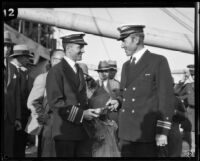 Commander Richard Byrd receives a gift from a fellow military officer, Los Angeles, 1928
