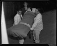 Murder suspect Gladys Carter in stretcher, Los Angeles County, 1935