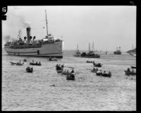 Boats and swimmers in Isthmus Cove at the start of the Wrigley Ocean Marathon, Santa Catalina Island, 1927