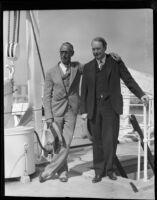 Fred MacIsaac and Frank Condon on a board a ship that just returned from Hawaii, San Pedro (Los Angeles), 1931
