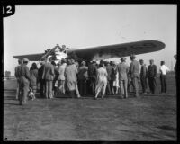 C. B. D. Collyer waves to a crowd from the Yankee Doodle monoplane after a transcontinental flight, Los Angeles, 1928