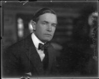 Distric Attorney Thomas Lee Woolwine looking melancholy, Los Angeles, 1920-1923