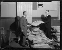 Leon Yankwich and M. J. Donoghue with ballot envelopes, Los Angeles, 1932