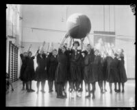 Mrs. S. Gross and some of the girls at the Y.W.C.A. playing cage ball, Los Angeles, 1926