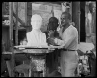 Ernest Yerbysmith in his studio with a bust sculpture, West Hollywood, 1930