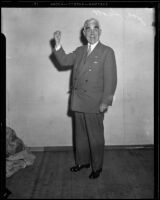 Joseph Scott with a raised fist, Los Angeles, 1930s