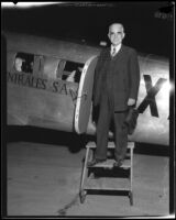 Joseph Scott disembarks from a plane, Los Angeles vicinity, circa 1930s