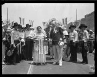 Consuela Castillo De Bonzo and mayor John Porter at a ribbon cutting ceremony for an extension of Spring street, Los Angeles, 1932