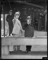 Mayor Frank L. Shaw and Fire Chief R. J. Scott at shooting range, Los Angeles, ca. 1930s