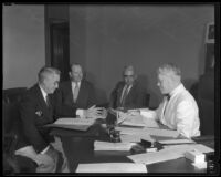 Judge Charles S. Crail, Earl G. Johnstone, Allen B. Walker, and B. J. Bradner meet to probate actress Marie Dressler's will, 1934