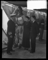 Vice-Admiral Thomas T. Craven, Miss Nancy Penoyer, and Morgan Slayton at a tea, Long Beach, 1934