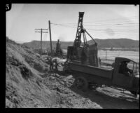 Road work after the flood resulting from the failure of the Saint Francis Dam, Santa Clara River Valley (Calif.), 1928