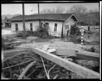 House washed by flood into middle of street after the failure of the Saint Francis Dam, Santa Paula (Calif.), 1928