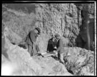 Geologists and civil engineers (probably) investigating the failure of the Saint Francis Dam, San Francisquito Canyon (Calif.), 1928