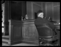 Judge William Dehy sitting at the judge's bench, Inyo County, 1927