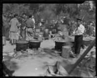 Relief workers preparing food at an outdoor kitchen after the Long Beach earthquake, Southern California, 1933