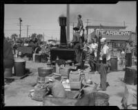 Sailor in an outdoor kitchen for food relief after the Long Beach earthquake, Southern California, 1933