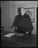 Judge Walter H. Evans of the Federal Customs Court in courtroom,  Los Angeles, 1933
