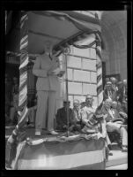 Postmaster-General Farley gives speech, possibly at Warner Brothers' Studios, California, 1934