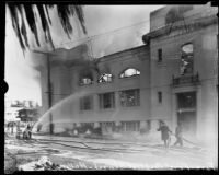 Firefighters attend the fire destroying the First Baptist Church of Hollywood, Hollywood, 1935