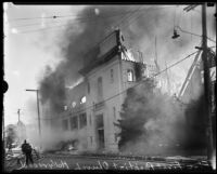 Firefighters attend the fire destroying the First Baptist Church of Hollywood, Hollywood, 1935