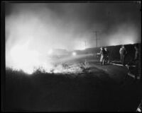 Firefighters hose La Crescenta fire, Los Angeles, 1933