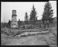 Men observe ruins of home destroyed by La Crescenta fires, Los Angeles, 1933