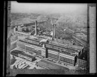Copy negative of an aerial photograph of the Firestone factories in Akon, Ohio, 1927