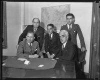 District Attorney Buron Fitts meets with his advisors over perjury charges, Los Angeles, 1934