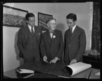 Harvey S. Firestone and sons look at blueprints, Los Angeles, 1935